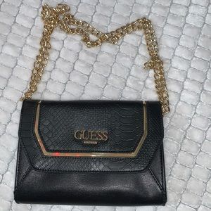 Black and gold guess mini bag
